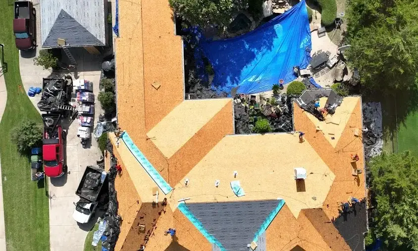 Professional Storm Damage Roof Repair being performed in Stone Mountain